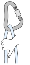 rope hanging in a carabiner with hand grabbing the rear string